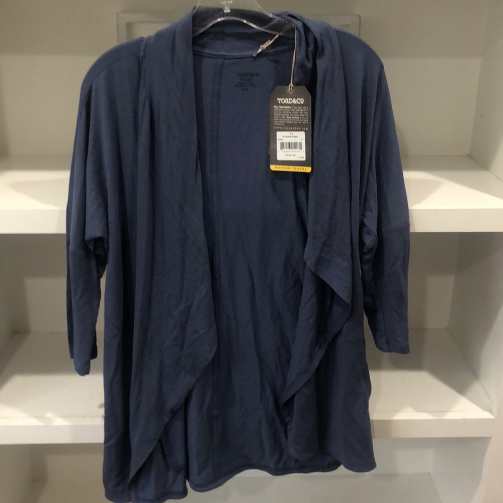 Fun open cardigan with pockets. Upf 40 eco
